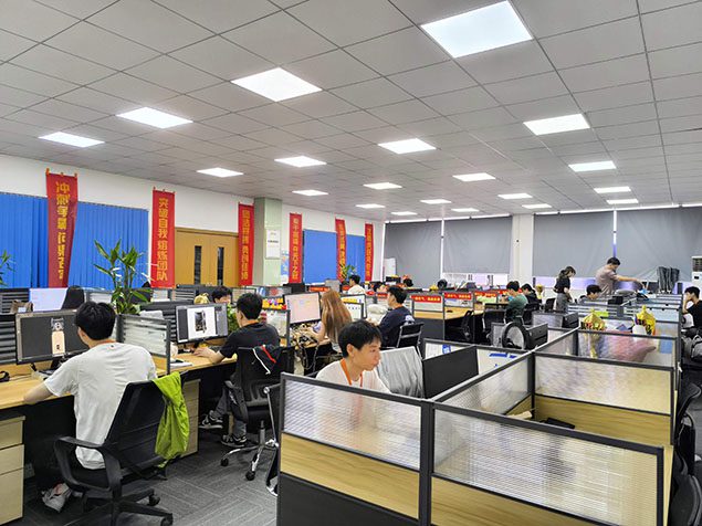 Inside view of Reyeah's sales and customer service center, featuring a professional team working in a modern office environment dedicated to global client support