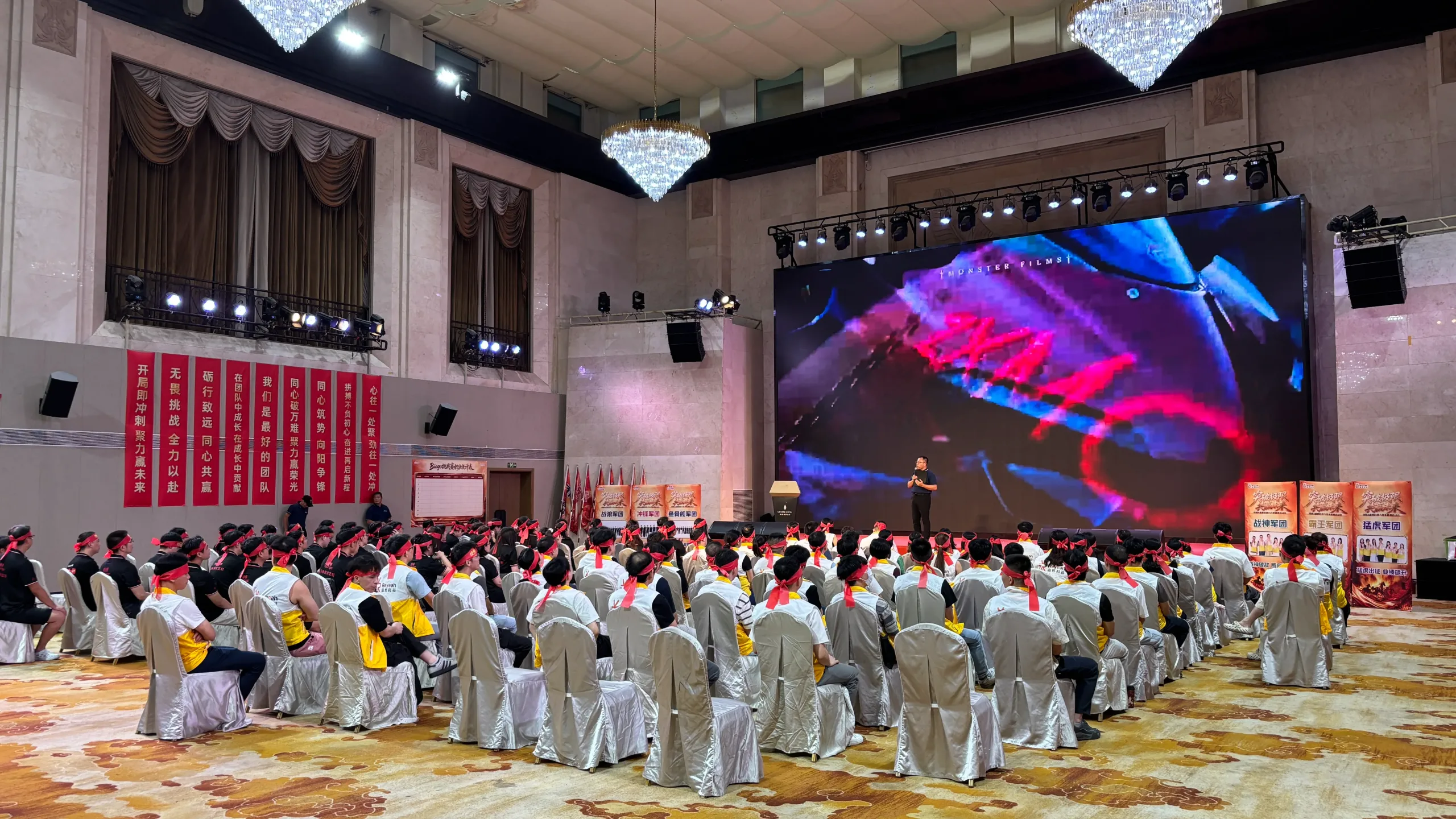 Teams attending the opening session of the Reyeah September Sales Challenge in a hotel ballroom