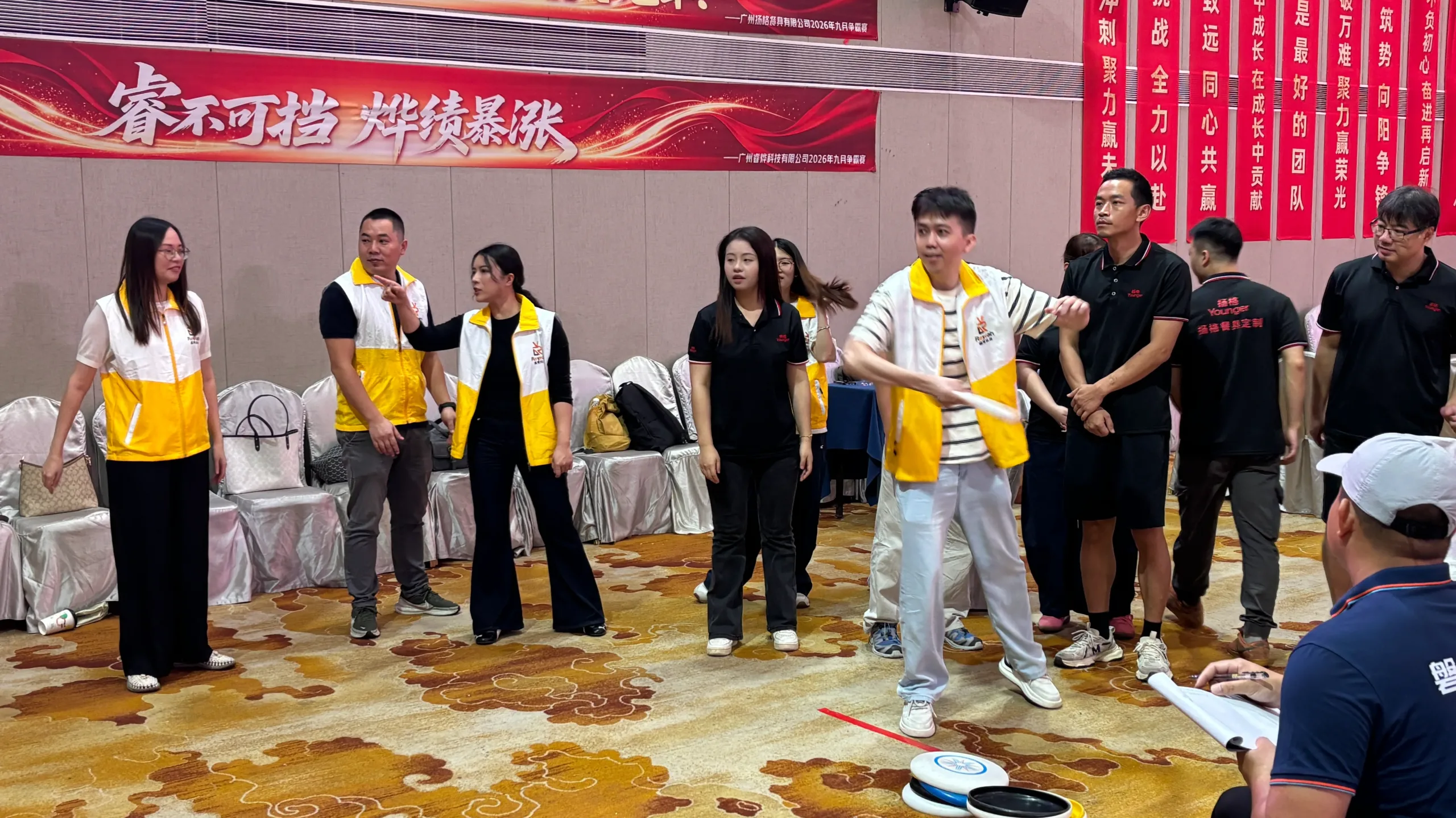 Reyeah and partner teams working together in an interactive group game at the sales challenge